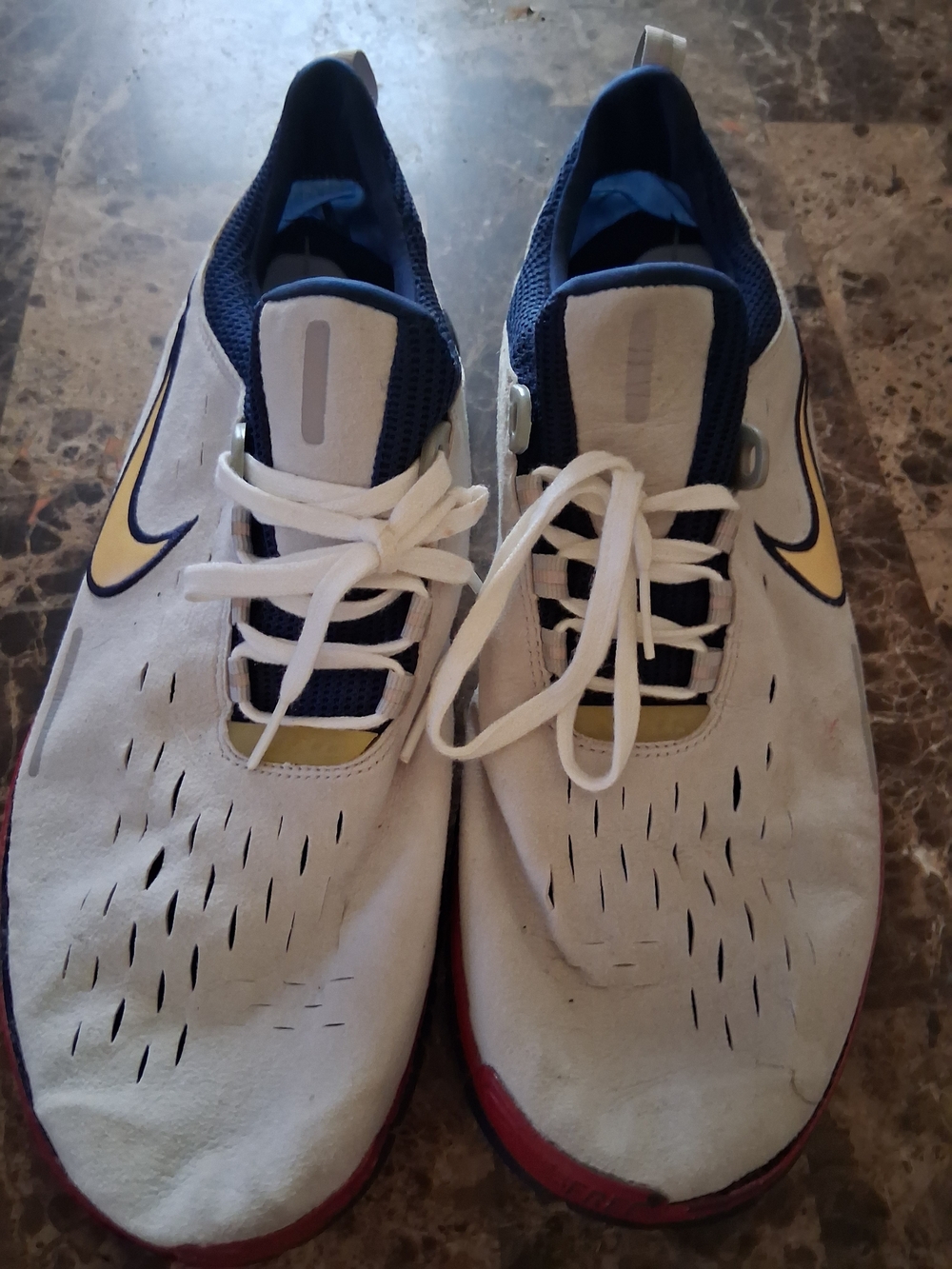 Nike White and Navy Athletic Shoes with Yellow Swoosh